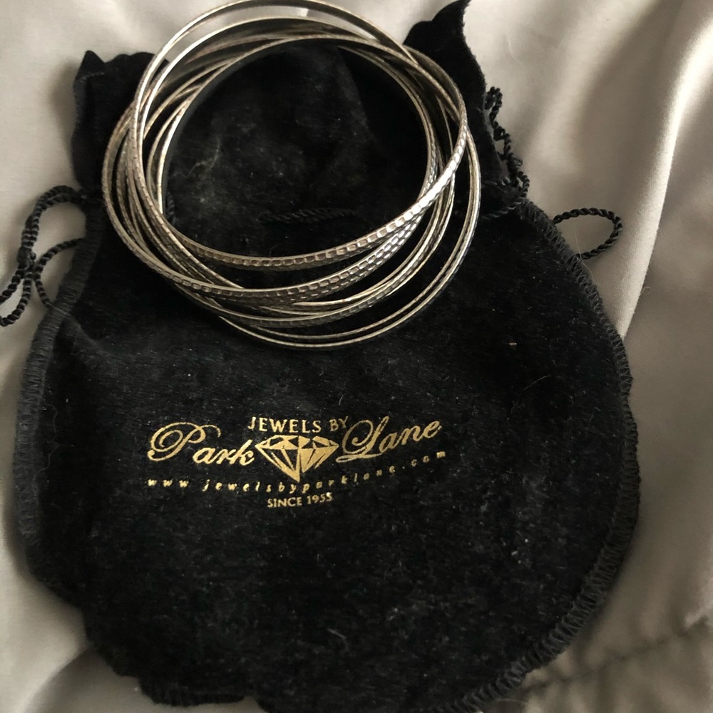 PARK LANE "VOLUME" BRACELETS 9 BANGLES, SILVERTONE